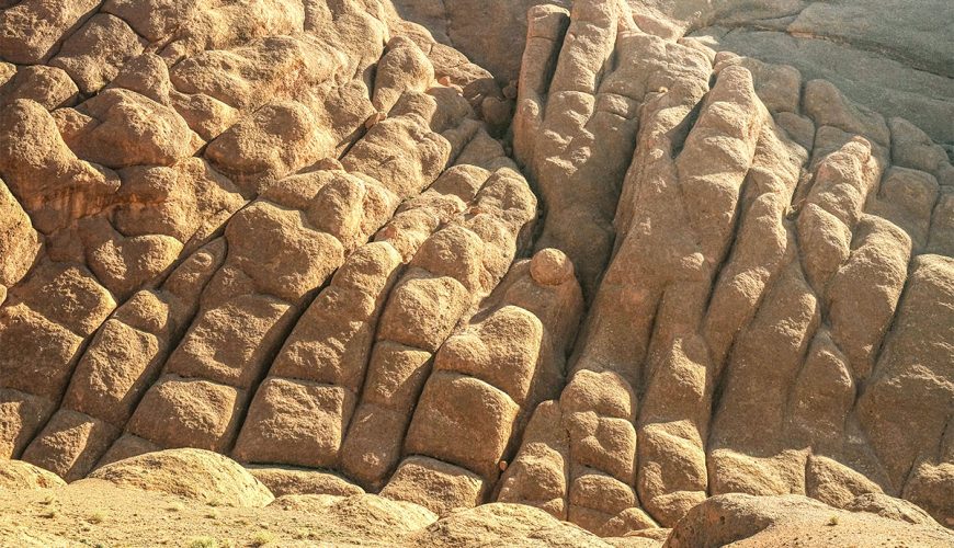 Stunning view of the Monkey Fingers rock formations in the Dades Valley, Morocco, with rugged mountains and terraced landscapes