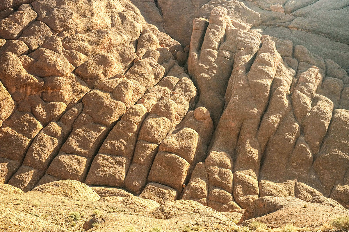 Stunning view of the Monkey Fingers rock formations in the Dades Valley, Morocco, with rugged mountains and terraced landscapes